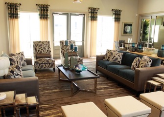 Sonterra Blue clubhouse with lounge seating and windows