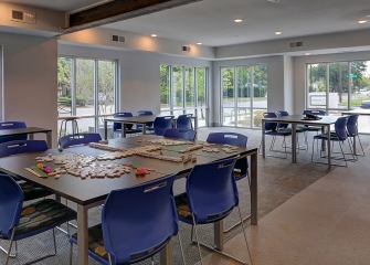Martha's Vineyard game room with tables and chairs